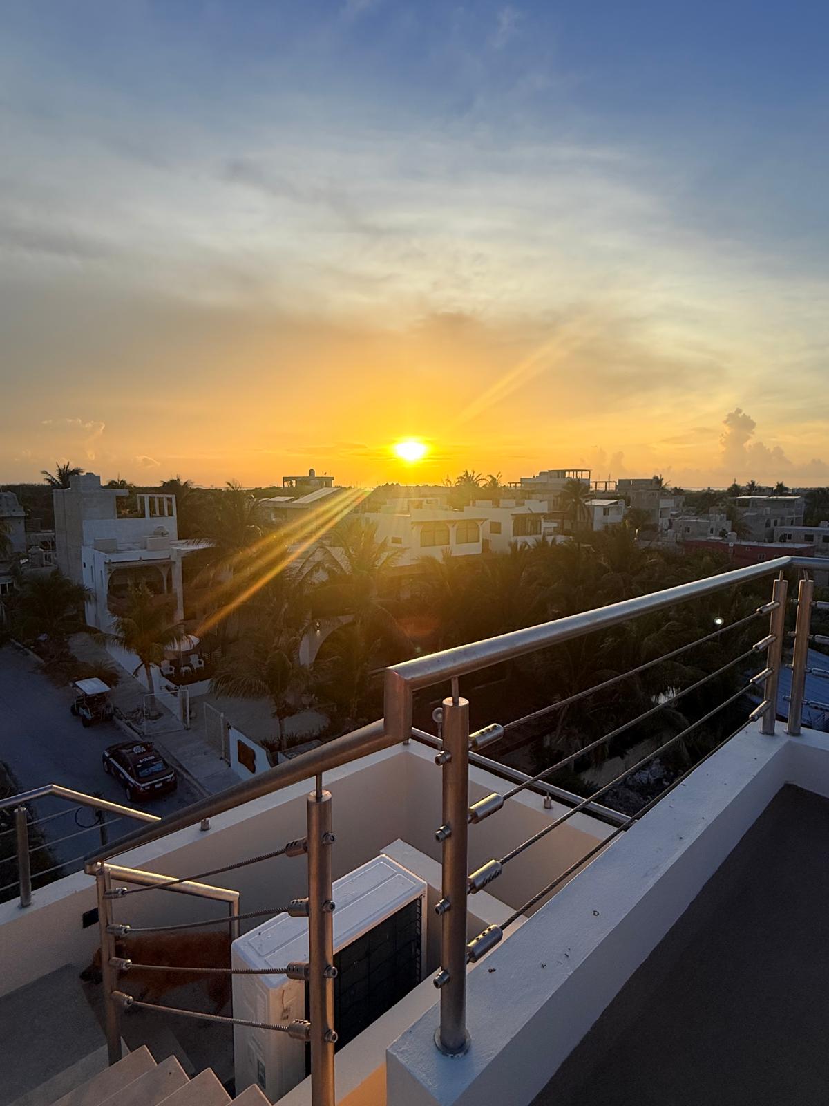 Sunrise over Isla Mujeres from the estate rooftop terrace