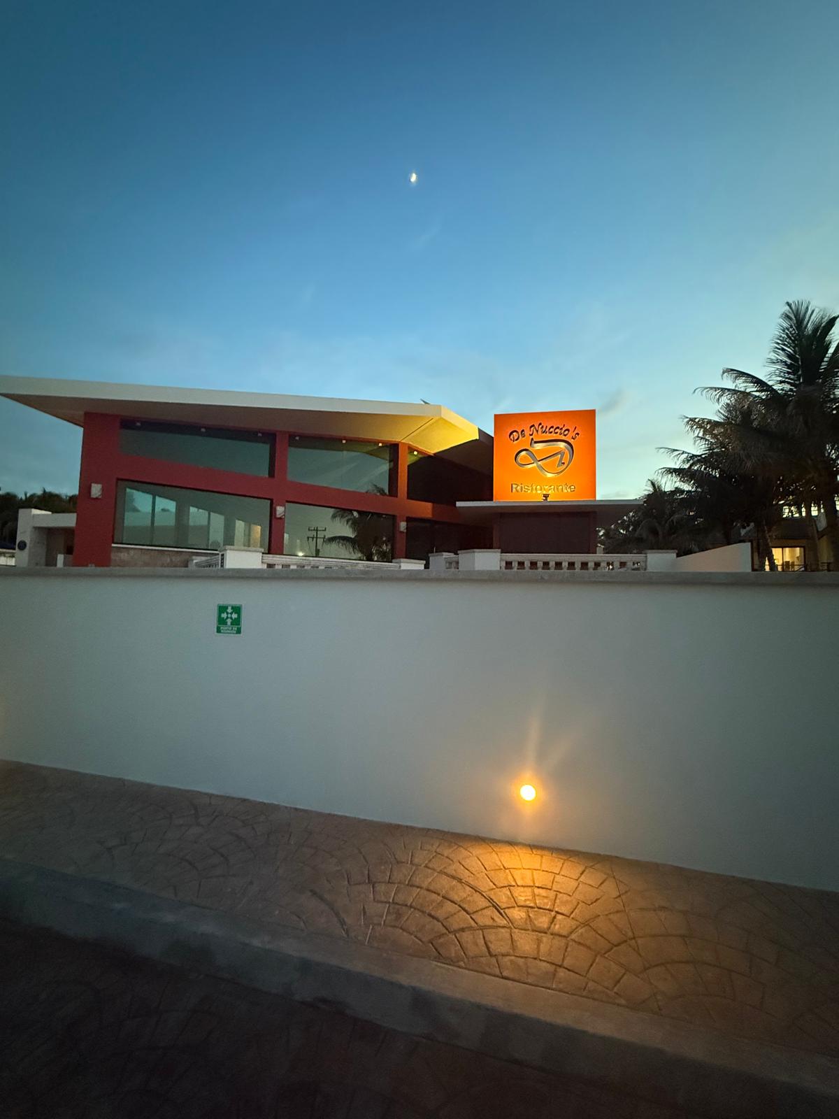 DeNuccio's Ristorante seen from the street at blue hour