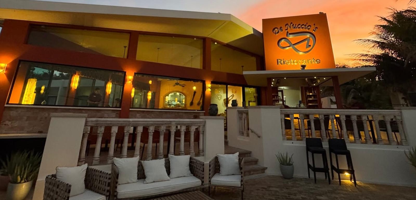 Ristorante terrace lounge glowing at sunset
